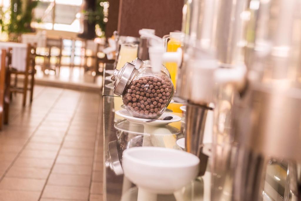 Stratus Vila Hotel ヴォルタ・レドンダ エクステリア 写真